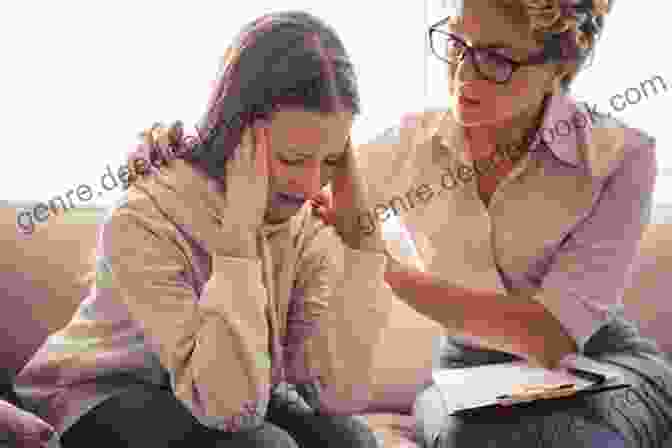 Image Of An Inmate Sitting Across From A Therapist, Working On Cognitive Behavioral Therapy Exercises. Our Class: Trauma And Transformation In An American Prison