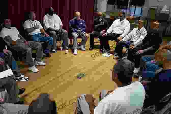 Image Of An Inmate Sitting In A Circle With Other Inmates, Listening To A Speaker At An Addiction Recovery Meeting. Our Class: Trauma And Transformation In An American Prison